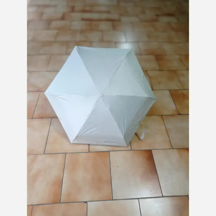 چتر جیبی کپسول دار مسافرتی ضد آب و ضد باد با محافظ آفتاب SPF 50